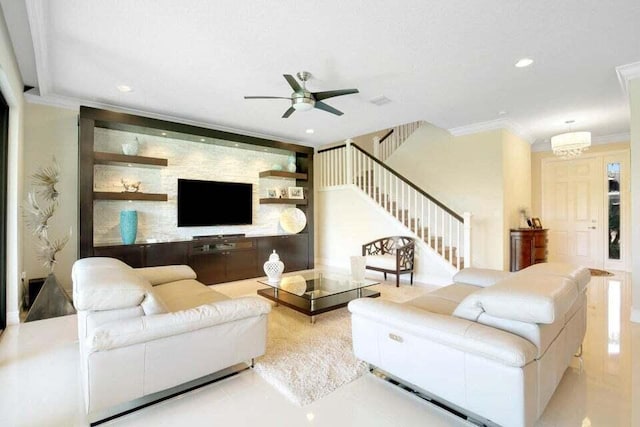 living room featuring ceiling fan and ornamental molding