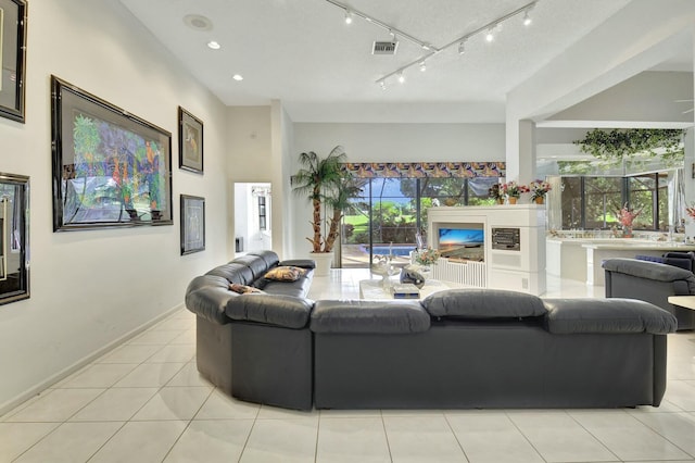 living room with light tile patterned floors