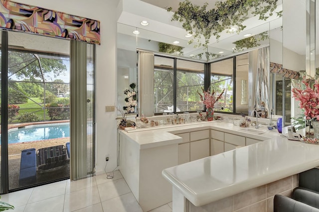 bathroom featuring tile patterned floors and vanity