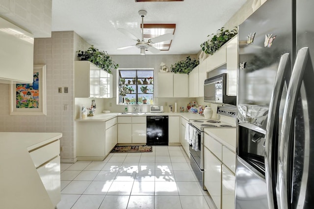 kitchen featuring dishwasher, white cabinets, stainless steel refrigerator with ice dispenser, ceiling fan, and range with electric stovetop