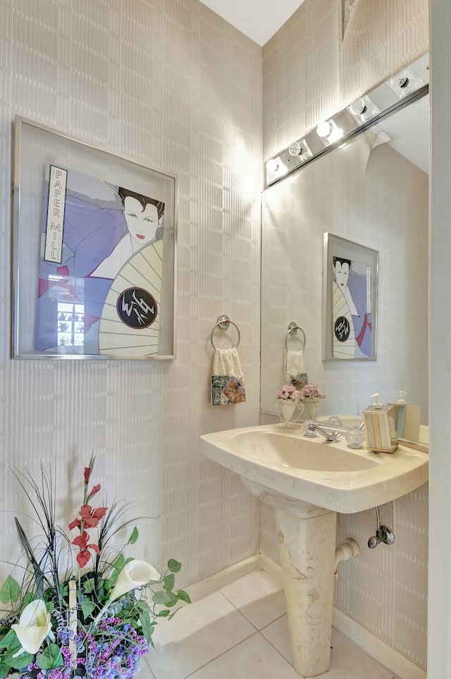 bathroom with tile patterned floors