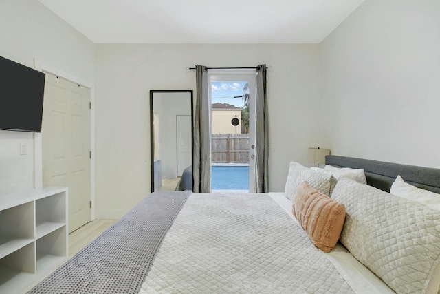 bedroom with light wood-type flooring