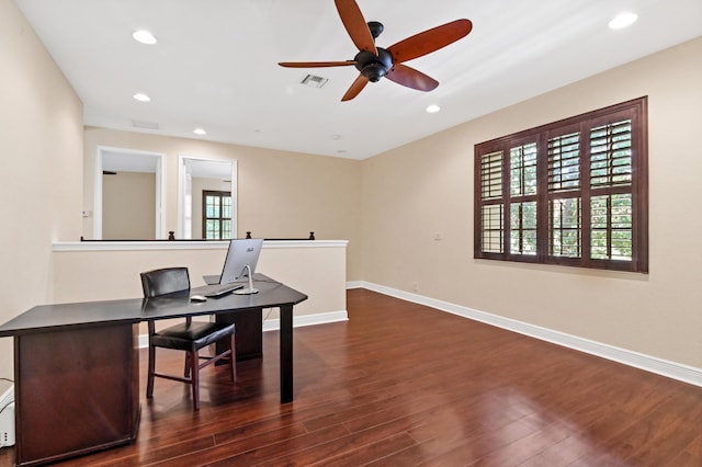 office area featuring ceiling fan, a healthy amount of sunlight, and dark hardwood / wood-style floors