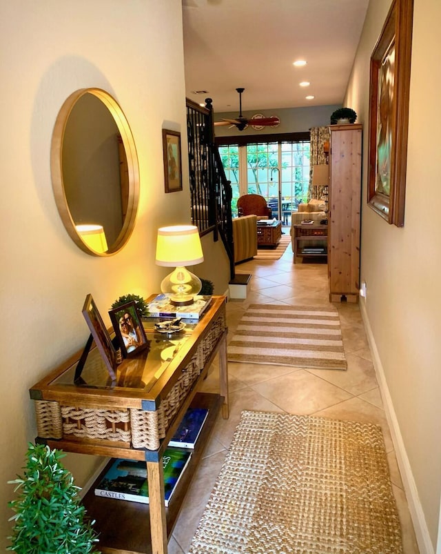 corridor with light tile patterned flooring