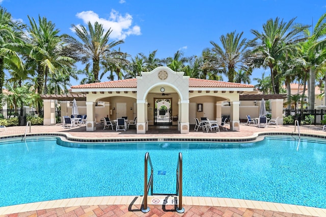 view of swimming pool featuring a patio