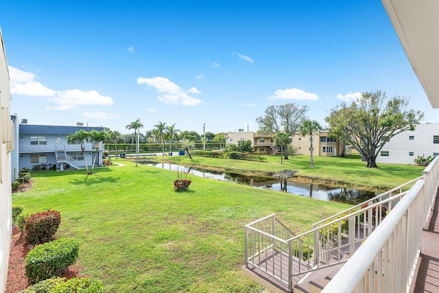 view of yard with a water view