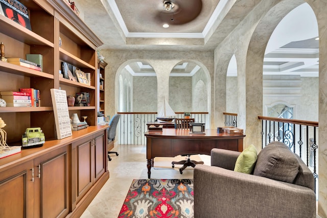 office area with a raised ceiling, crown molding, a high ceiling, and coffered ceiling