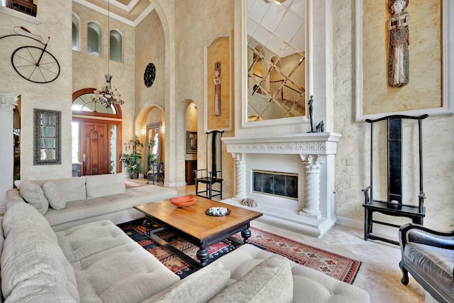 living room with a towering ceiling