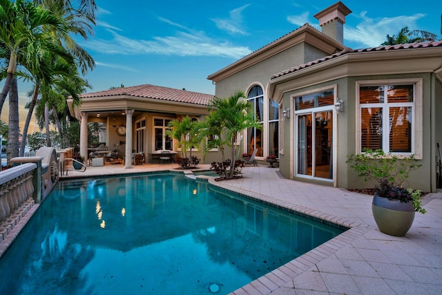 view of pool featuring a patio