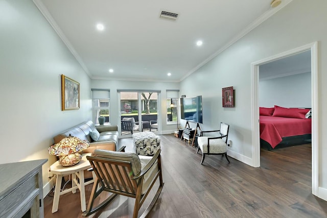 living room with crown molding and dark hardwood / wood-style floors