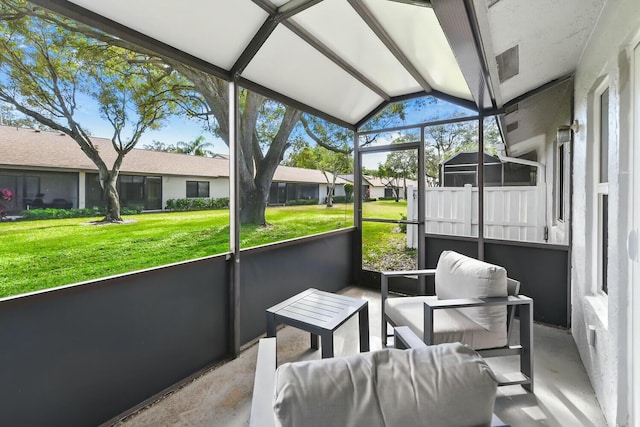 sunroom with lofted ceiling