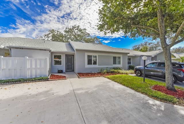 ranch-style home with a garage