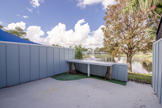 view of patio / terrace with a water view