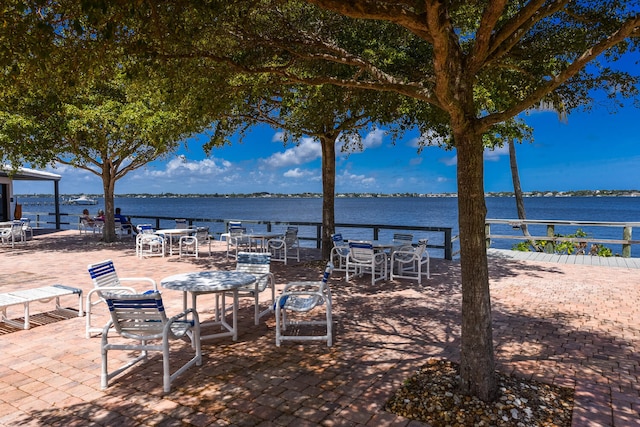 view of patio with a water view