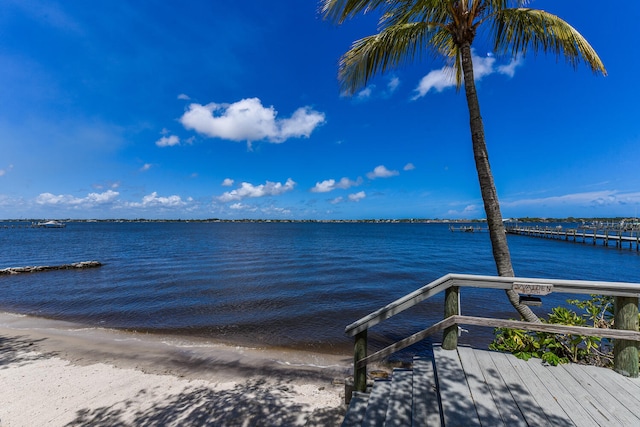 view of dock with a water view