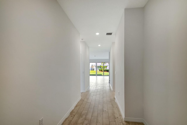 hall featuring light hardwood / wood-style flooring