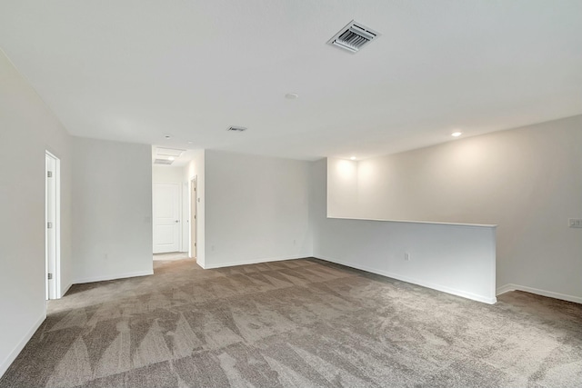 spare room featuring carpet flooring