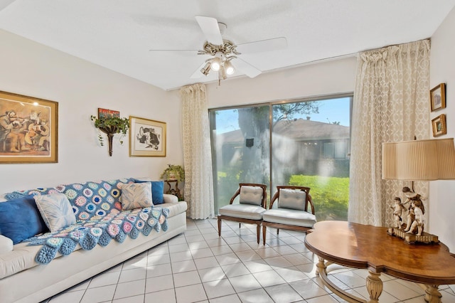 living room featuring light tile patterned floors and ceiling fan