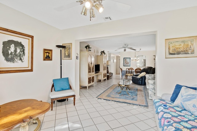 living room featuring light tile patterned flooring