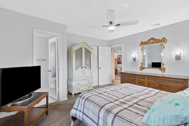 carpeted bedroom featuring connected bathroom and ceiling fan