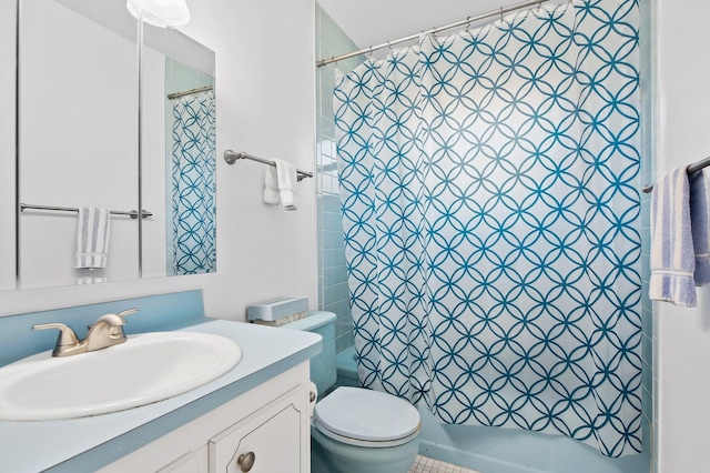 bathroom featuring vanity, toilet, and walk in shower