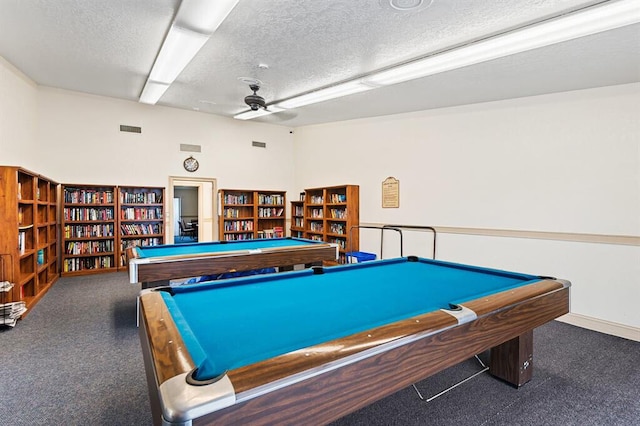 playroom featuring ceiling fan, a textured ceiling, and billiards