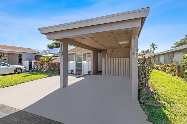 view of patio / terrace featuring a carport and central air condition unit