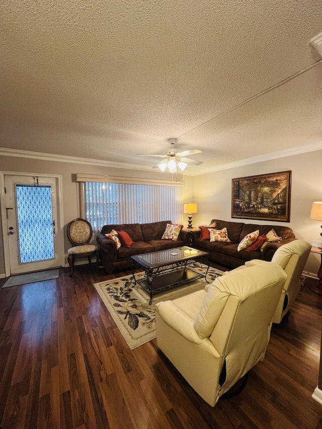 living room featuring dark hardwood / wood-style flooring, a textured ceiling, ceiling fan, and crown molding