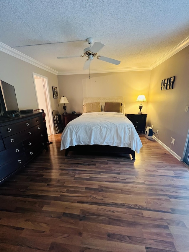 bedroom with a textured ceiling, hardwood / wood-style flooring, ceiling fan, and ornamental molding