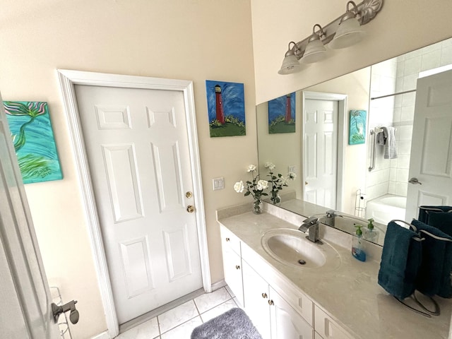 bathroom featuring vanity, tile patterned floors, and shower / bathtub combination