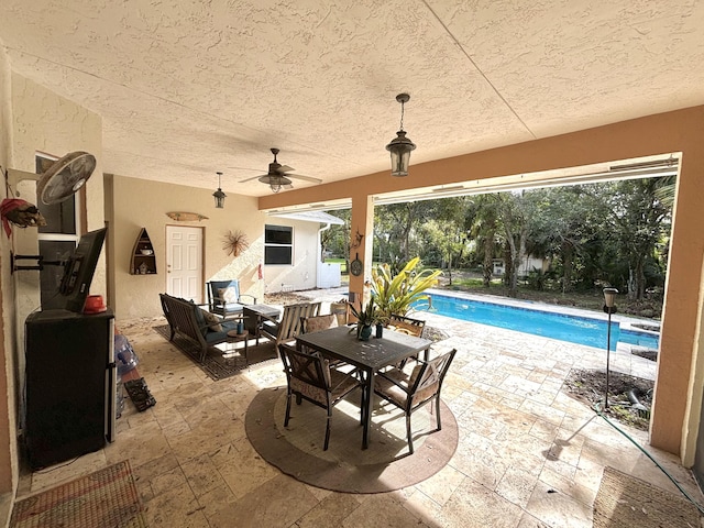 view of patio with ceiling fan