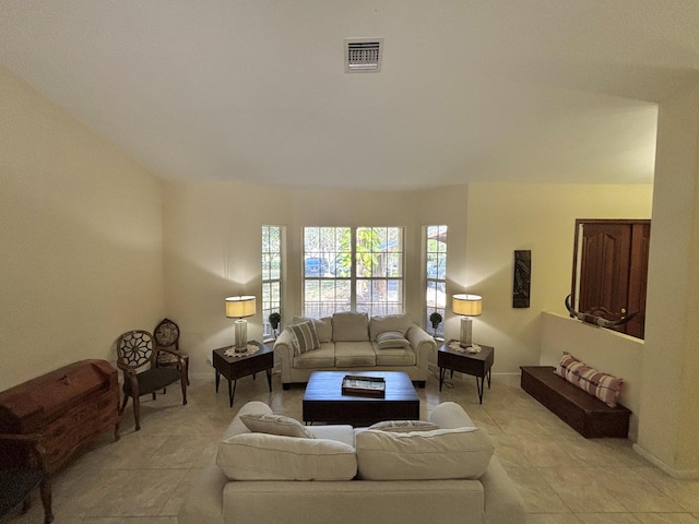 living room with light tile patterned flooring