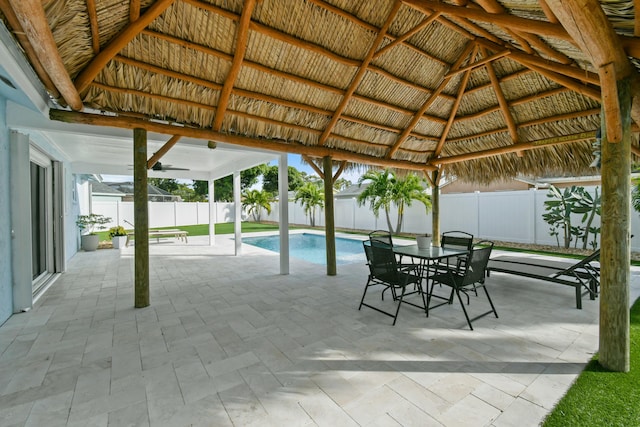 view of swimming pool with a gazebo and a patio area