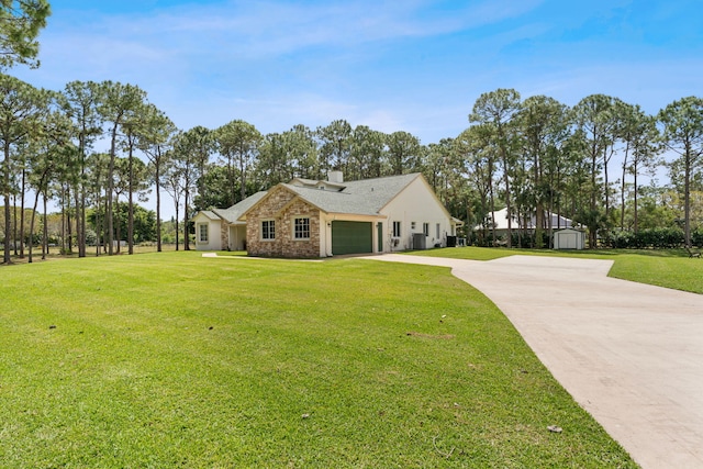 exterior space with a front lawn and a garage