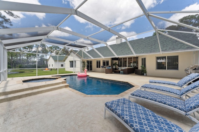 view of swimming pool featuring outdoor lounge area, a patio, an in ground hot tub, and a lanai