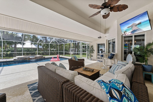 view of patio / terrace with a swimming pool with hot tub, an outdoor hangout area, ceiling fan, and a lanai