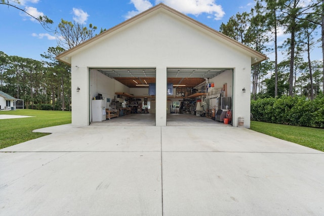 garage with a lawn