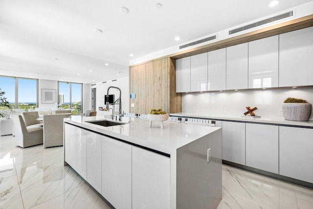 495 E Royal Palm Rd Unit 601, Boca Raton, FL 33432 - living area featuring a wall of windows, recessed lighting, light marble finish floors, and a city view
