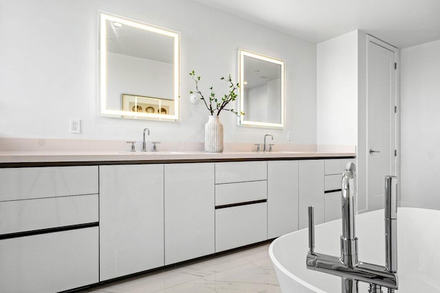 495 E Royal Palm Rd Unit 601, Boca Raton, FL 33432 - full bathroom with marble finish flooring, double vanity, and a freestanding tub