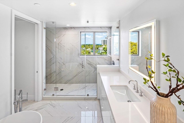 495 E Royal Palm Rd Unit 601, Boca Raton, FL 33432 - bathroom featuring a marble finish shower, a freestanding bath, marble finish floors, vanity, and recessed lighting
