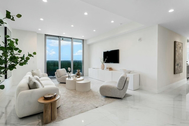 living room with floor to ceiling windows