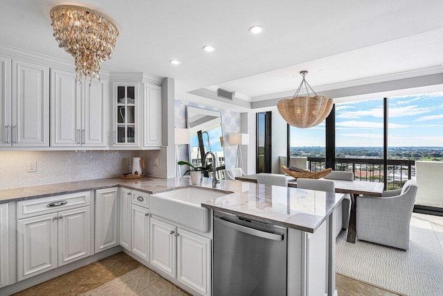 kitchen with glass insert cabinets, white cabinets, a peninsula, and stainless steel dishwasher