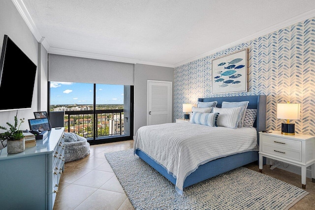 tiled bedroom featuring access to outside, crown molding, and a textured ceiling