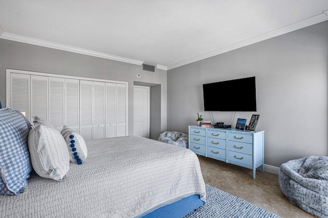 bedroom with ornamental molding and a closet