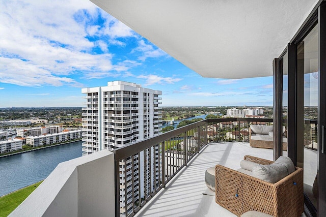 balcony featuring a water view