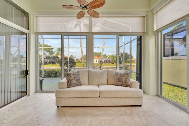 sunroom with ceiling fan and a healthy amount of sunlight