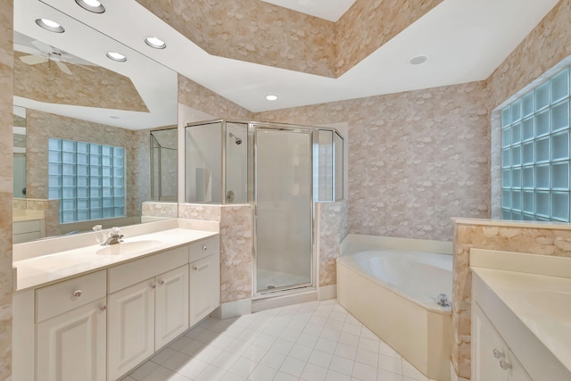 bathroom with separate shower and tub, ceiling fan, tile patterned flooring, and vanity