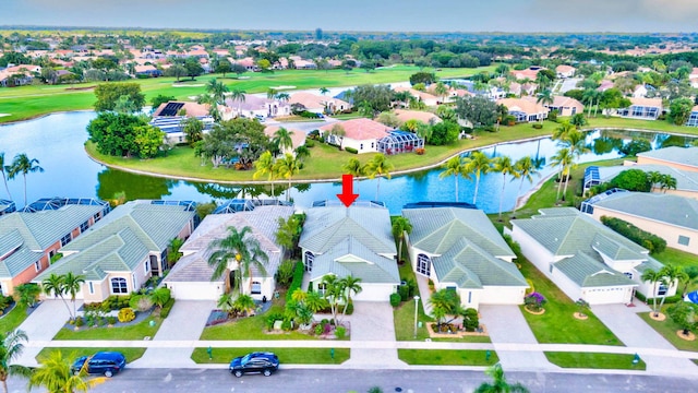 bird's eye view with a water view