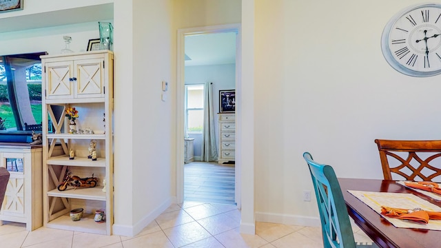 hallway with light tile patterned flooring