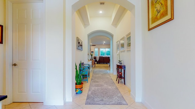 hallway with light tile patterned flooring